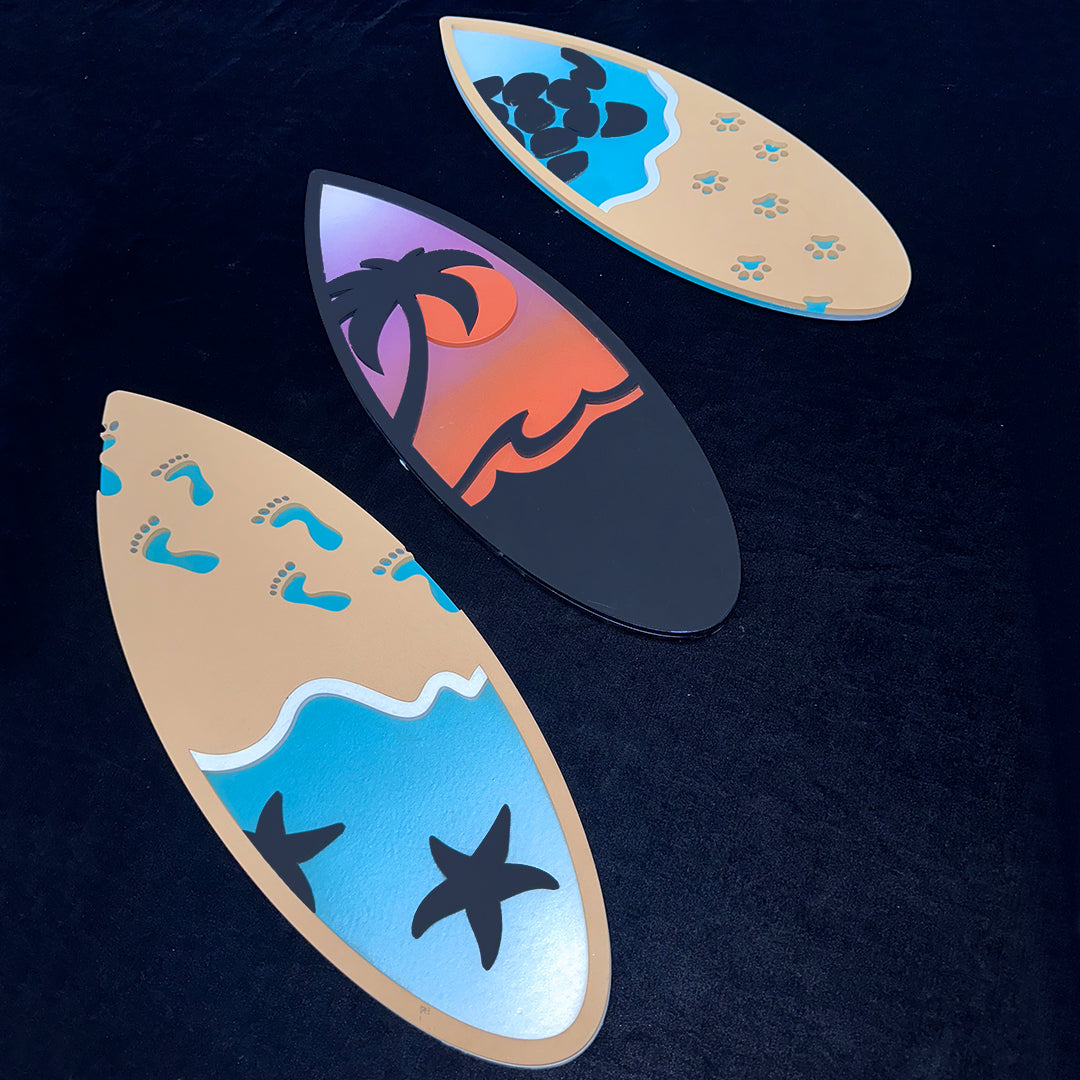Ride the waves of style with this trio of surfboard-shaped mid-century modern luxury wall pieces